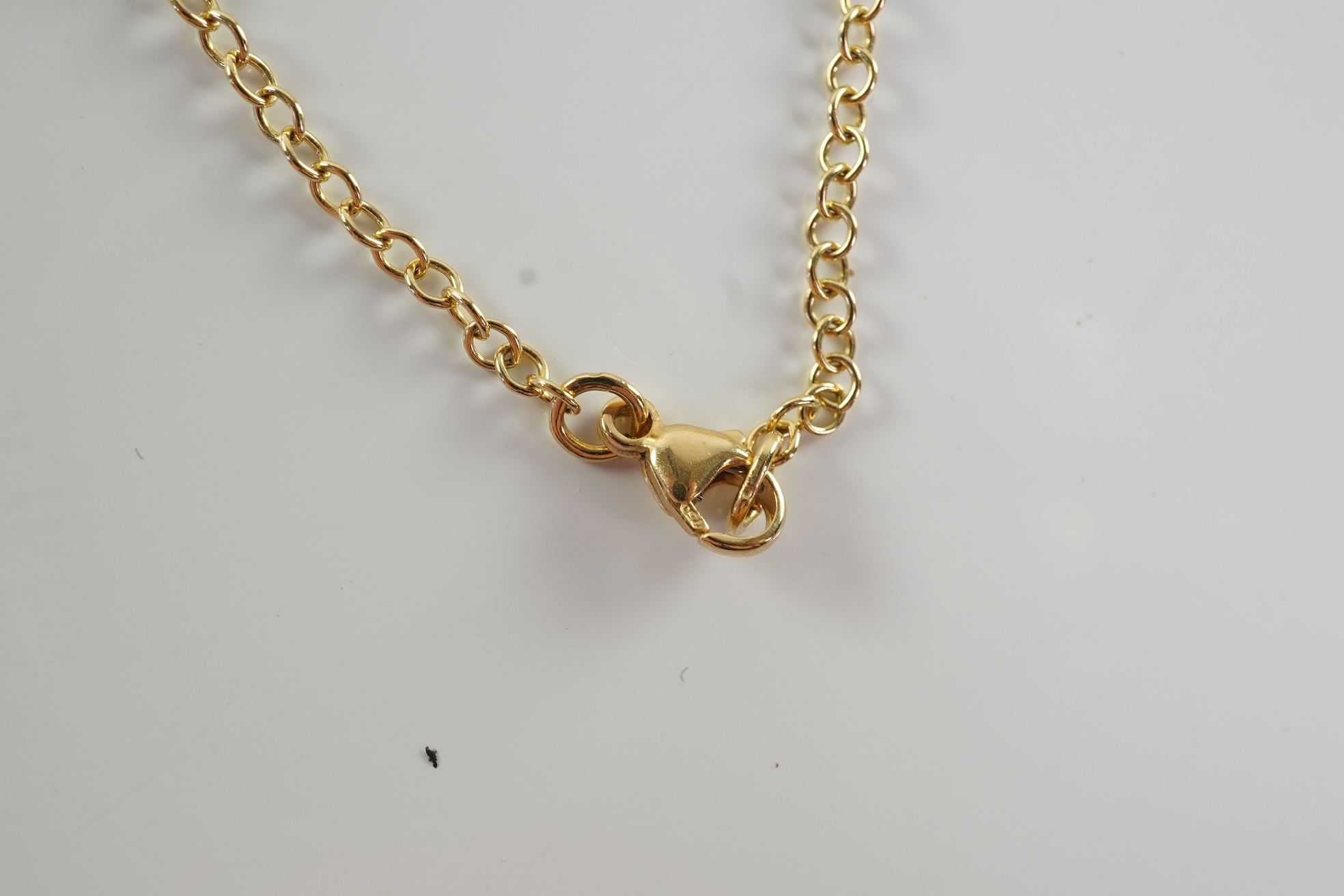 An Edwardian pearl and enamel cross and chain, early 20th century